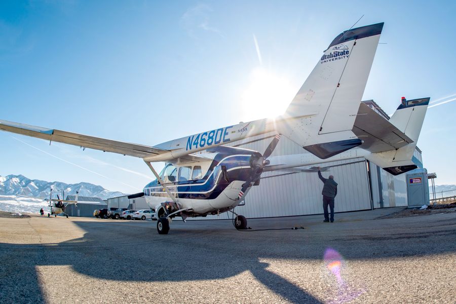 An aircraft in front of SDL's aircraft hangar in Logan, Utah.