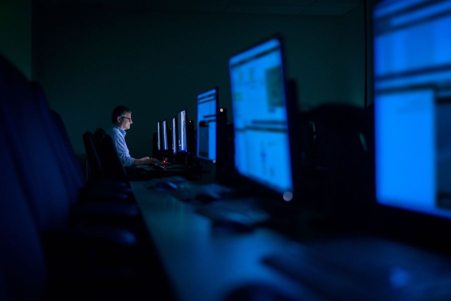 A software engineer working at a computer.