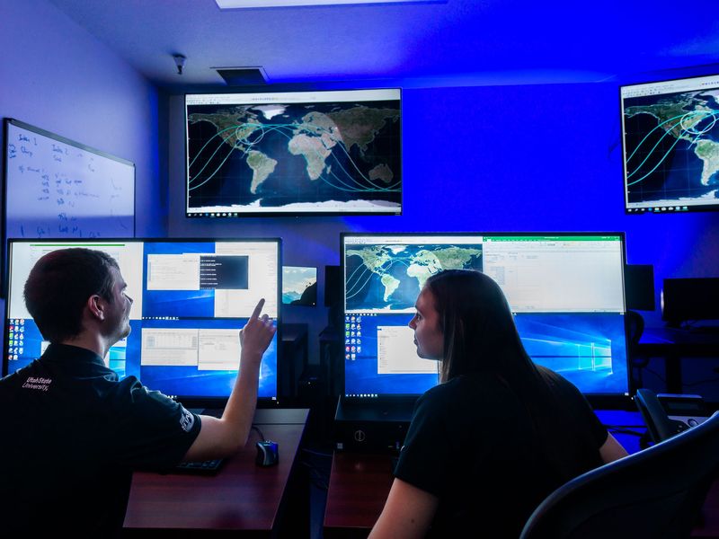 Satellite operators in a mission operations center.