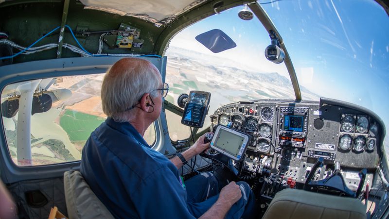 View of the pilot and surrounding area during a flight test.