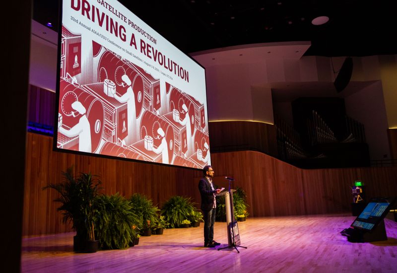 A person presenting at an event.