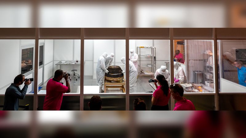 Curation teams process the sample return capsule from NASA’s OSIRIS-REx mission in a cleanroom, Sunday, Sept. 24, 2023, at the Department of Defense's Utah Test and Training Range. The sample was collected from the asteroid Bennu in October 2020 by NASA’s OSIRIS-REx spacecraft. (Photo Credit: NASA/Keegan Barber)