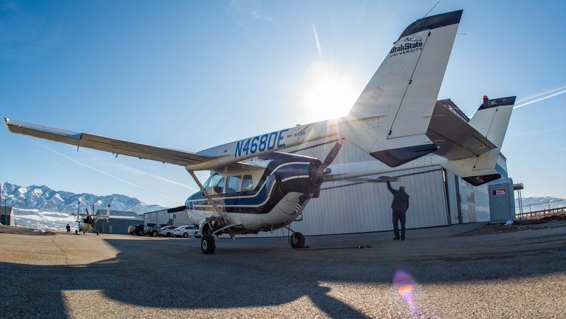 An aircraft in front of SDL's hangar.