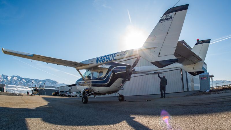 An aircraft in front of SDL's hangar.