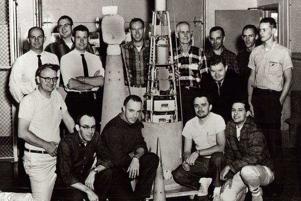 Early photo of SDL staff, students, and an instrument from the 1960s.