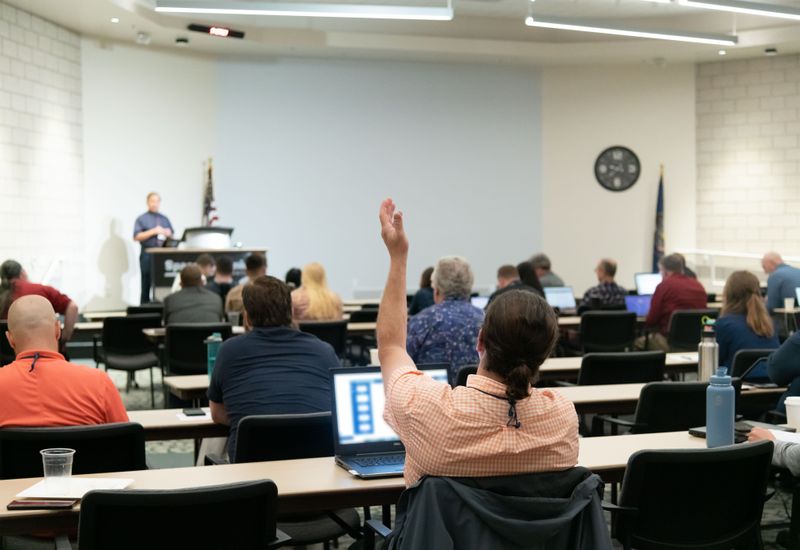 People attending a meeting.