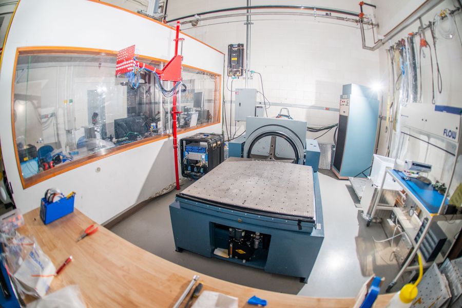 A vibration test table inside a laboratory.