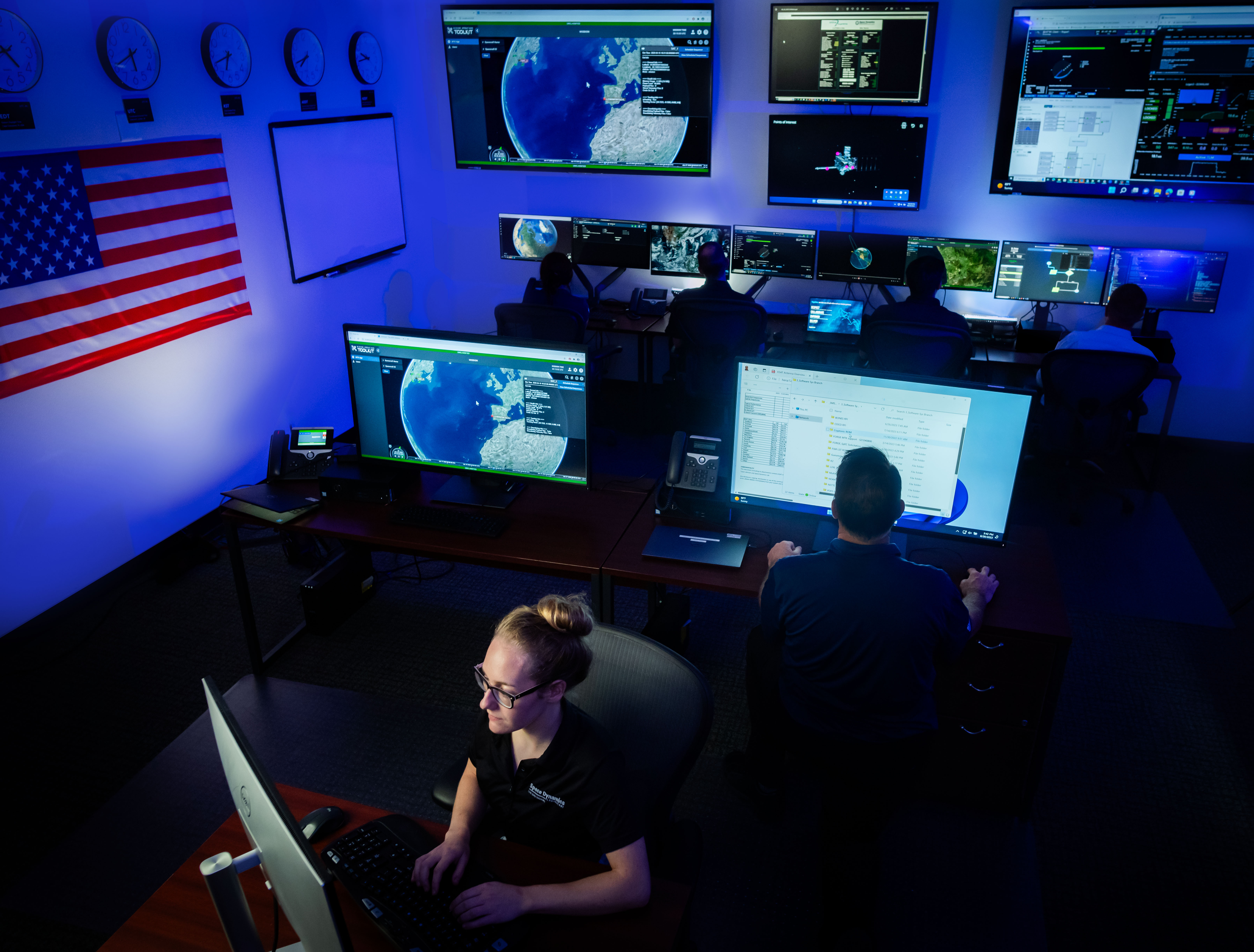 Mission operations center personnel working a mission.