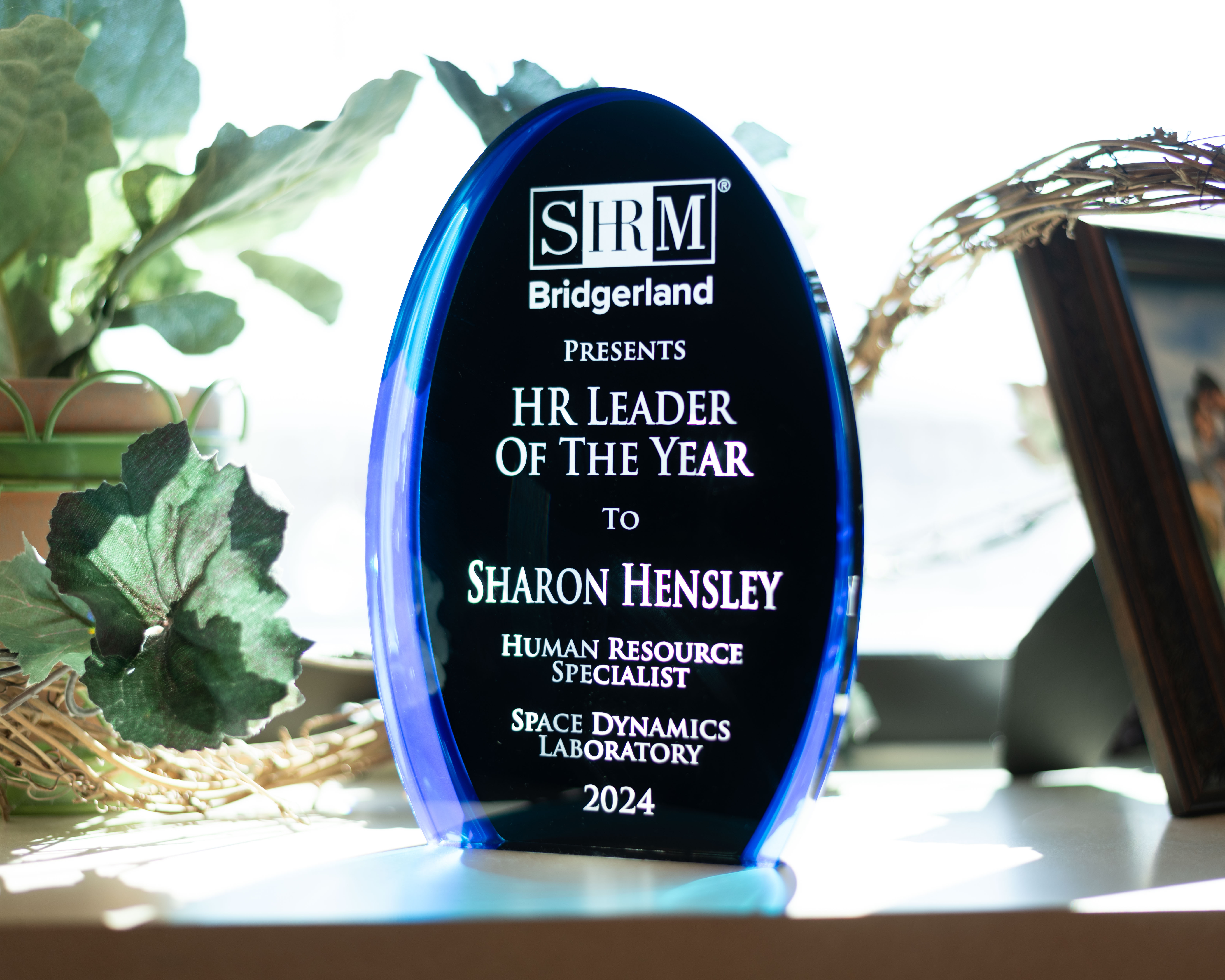 Sharon Hensley’s HR Leader of the Year award on display in her office.